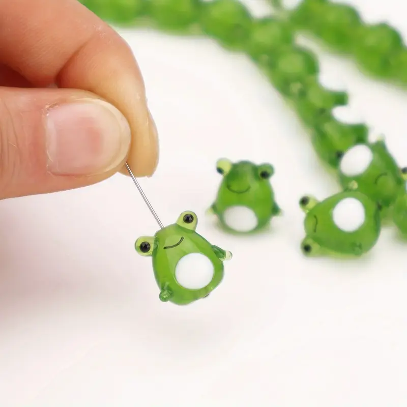 9042b476-553c-4f51-8cd7-a7b724450207 Frog-glass-beads